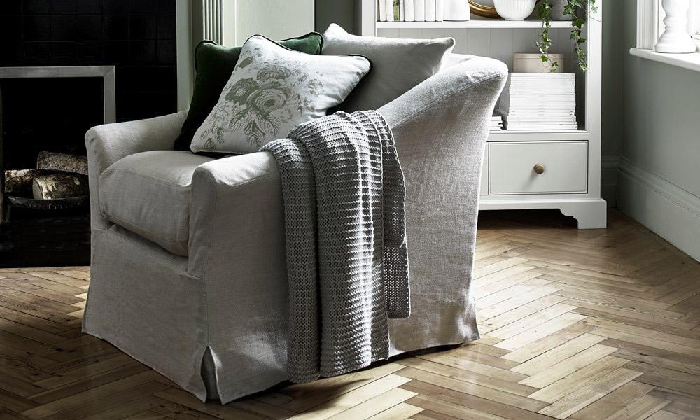 Long Island armchair with linen loose cover by Neptune